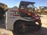 Used Takeuchi,Side of used Track Loader,Back of used Track Loader